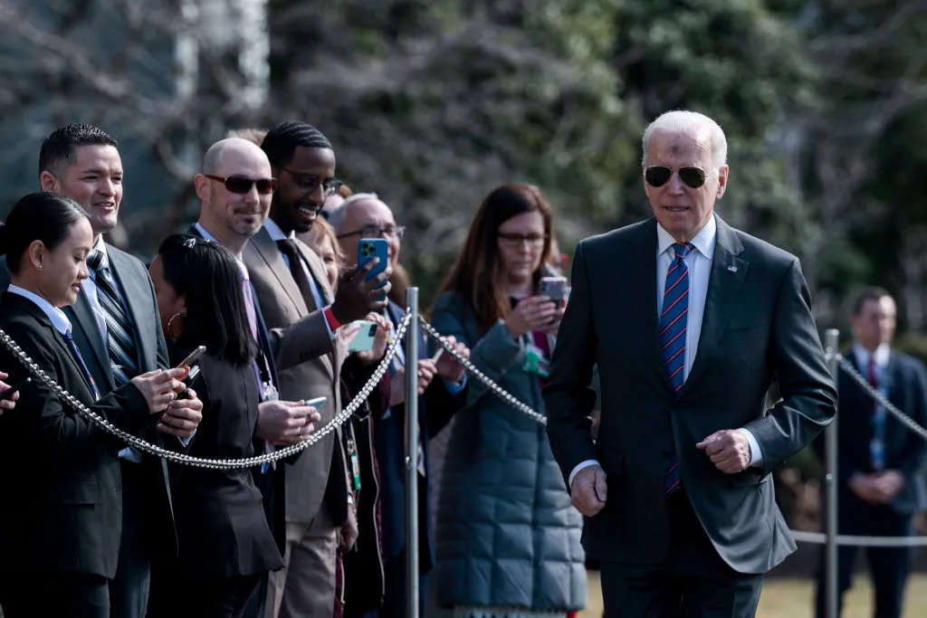 President Joe Biden, with ashes on his forehead in honor of Ash Wednesday, walks to speak to reporters before boarding Marine One with First Lady Jill Biden on the South Lawn of the White House on March 02, 2022 in Washington, DC. The Bidens are spending the day in Superior, Wisconsin, with cabinet members where they will give remarks on the bipartisan infrastructure legislation.?w=200&h=150