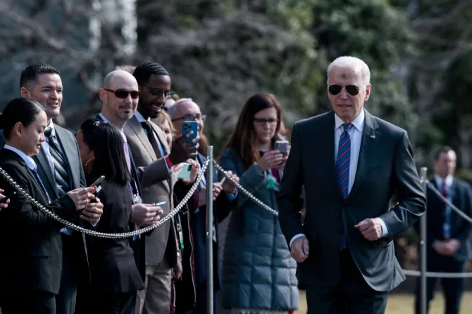 President Joe Biden, with ashes on his forehead in honor of Ash Wednesday, walks to speak to reporters before boarding Marine One with First Lady Jill Biden on the South Lawn of the White House on March 02, 2022 in Washington, DC.
