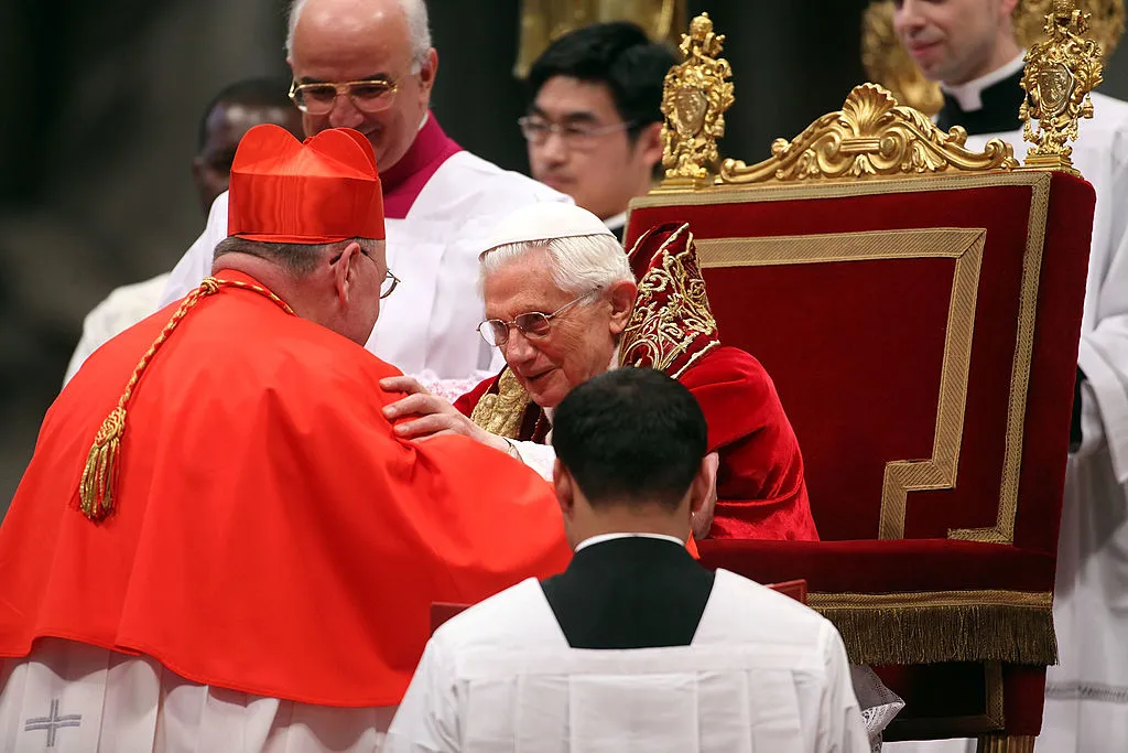 New cardinal Timothy Michael Dolan (L), Archbishop of New York, receives the biretta cap from Pope Benedict XVI in St. Peter's Basilica on Feb. 18, 2012, in Vatican City, Vatican.?w=200&h=150