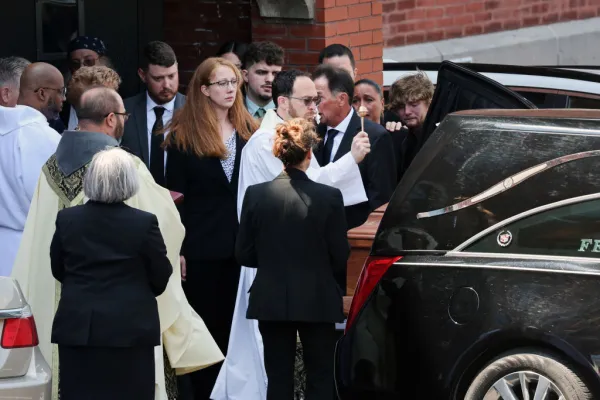 The casket of Roberta Drury, the youngest of those killed during the mass shooting at the Buffalo Tops supermarket on May 14th, is brought out following the funeral at Assumption Church on May 21, 2022 in Syracuse, New York. Drury, who was 32, had walked to the Tops market to pick up groceries for her mother when she was gunned down along with nine others in what is being described as an act of white supremacy. 18-year-old Payton Gendron is accused of the mass shooting that killed 10 people at the Tops grocery store on the east side of Buffalo on May 14th and is being investigated as a hate crime. Spencer Platt/Getty Images