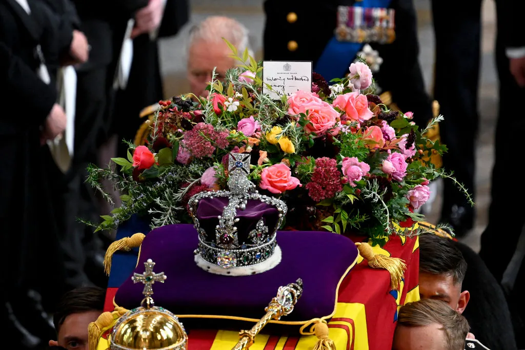 King Charles III walks alongside the coffin carrying Queen Elizabeth II with the Imperial State Crown resting on top as it departs Westminster Abbey during the State Funeral of Queen Elizabeth II on Sept. 19, 2022, in London. Elizabeth II died at Balmoral Castle in Scotland on Sept. 8, 2022, and is succeeded by her eldest son, King Charles III.?w=200&h=150