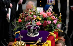 King Charles III walks alongside the coffin carrying Queen Elizabeth II with the Imperial State Crown resting on top as it departs Westminster Abbey during the State Funeral of Queen Elizabeth II on Sept. 19, 2022, in London. Elizabeth II died at Balmoral Castle in Scotland on Sept. 8, 2022, and is succeeded by her eldest son, King Charles III. Photo by Gareth Cattermole/Getty Images