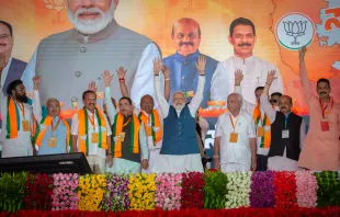 India's Prime Minister Narendra Modi waves to the his supporters during a political event organised by the Bharatiya Janata Party (BJP) at the GMIT College Grounds on March 25, 2023, in Davangere, India. Credit: Abhishek Chinnappa/Getty Images