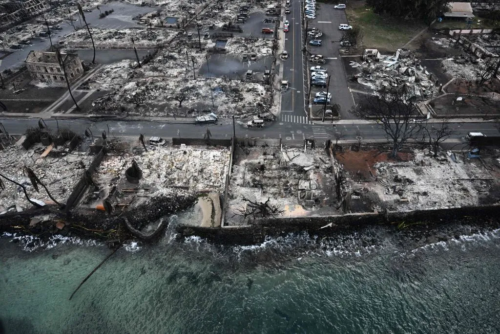 An aerial image taken on Aug. 10, 2023, shows destroyed homes and buildings burned to the ground in Lahaina along the Pacific Ocean in the aftermath of wildfires in western Maui, Hawaii.?w=200&h=150