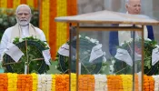 U.S. President Joe Biden and India’s Prime Minister Narendra Modi pay respect at the Mahatma Gandhi memorial at Raj Ghat on the sidelines of the G20 summit in New Delhi on Sept. 10, 2023.
