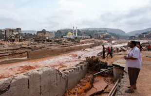 People look at the damage caused by flash floods in Derna, eastern Libya, on Sept. 11, 2023. Credit: AFP via Getty Images