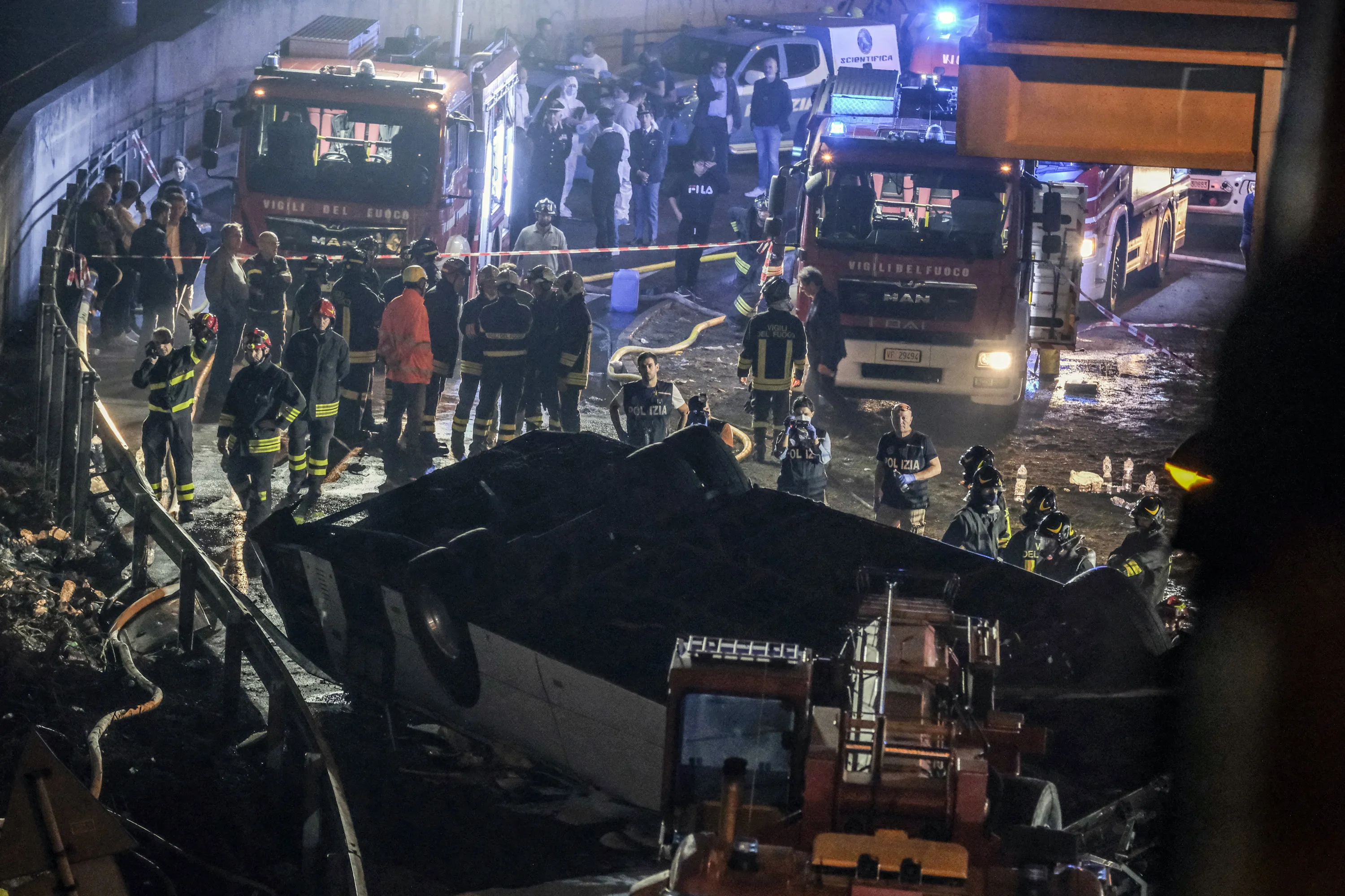 Emergency crew members work at the scene after a bus accident near Venice on Oct. 3, 2023, in Mestre, Italy.?w=200&h=150