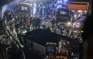 Emergency crew members work at the scene after a bus accident near Venice on Oct. 3, 2023, in Mestre, Italy. Credit: Stefano Mazzola/Getty Images