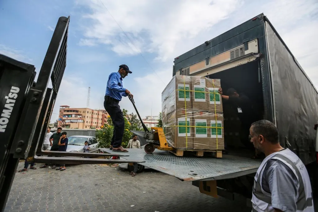 Workers distribute medical aid and medicines to Nasser Medical Hospital in the city of Khan Yunis, south of the Gaza Strip, which recently arrived through the Rafah crossing on Oct. 29, 2023, in Khan Yunis, Gaza.?w=200&h=150