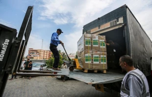 Workers distribute medical aid and medicines to Nasser Medical Hospital in the city of Khan Yunis, south of the Gaza Strip, which recently arrived through the Rafah crossing on Oct. 29, 2023, in Khan Yunis, Gaza. Credit: Ahmad Hasaballah/Getty Images
