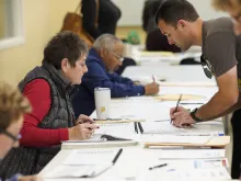 Voters check in at a polling location on Nov. 7, 2023, in Columbus, Ohio.