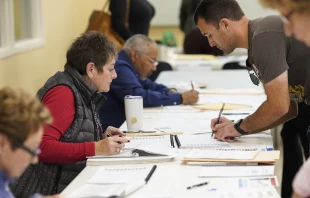 Voters check in at a polling location on Nov. 7, 2023, in Columbus, Ohio. Credit: Andrew Spear/Getty Images
