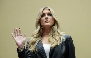 Former collegiate swimmer Riley Gaines is sworn in during a House Oversight Subcommittee on Health Care and Financial Services hearing on Capitol Hill on Dec. 5, 2023, in Washington, D.C. Credit: Drew Angerer/Getty Images