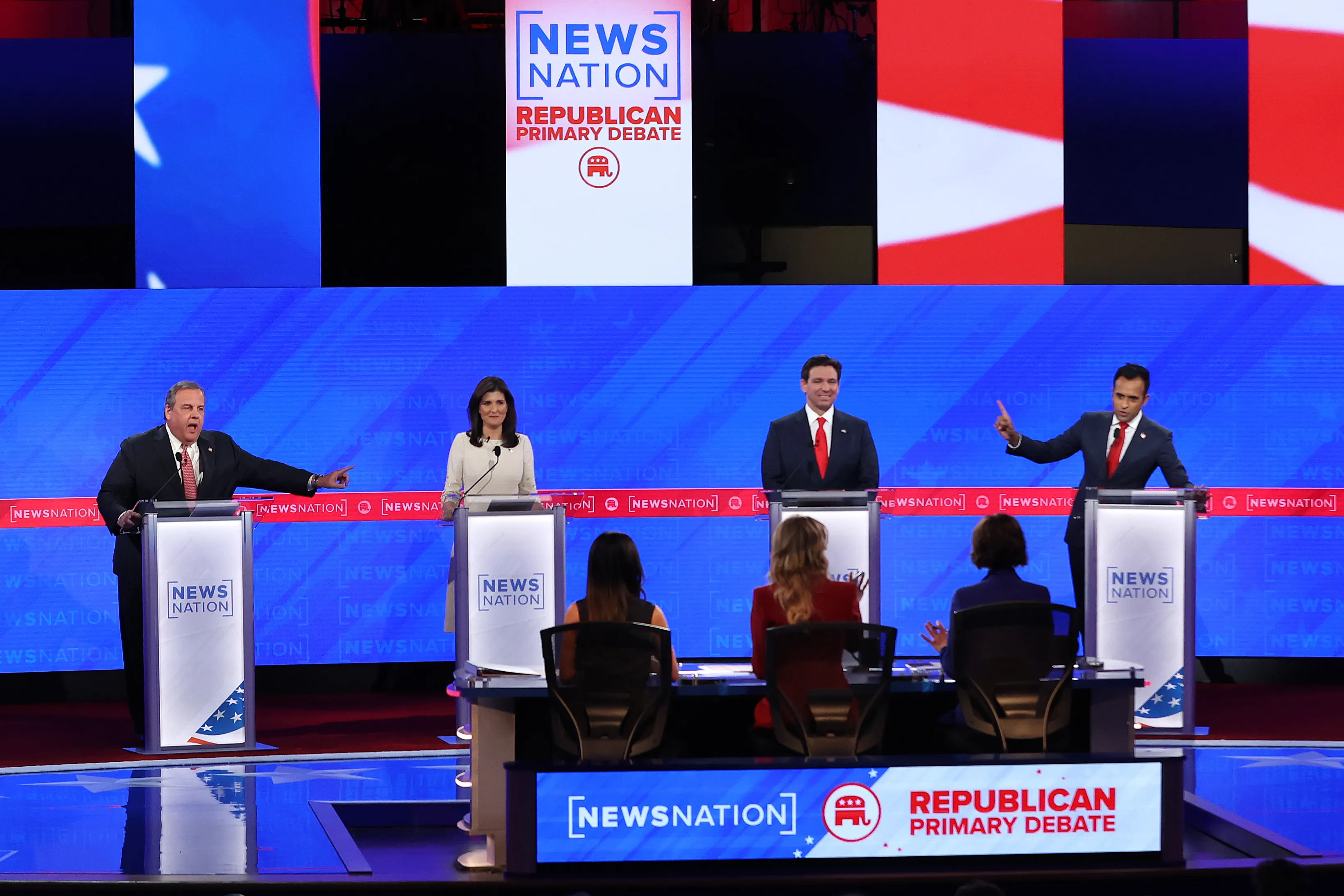 Republican presidential candidates (left to right) former New Jersey Gov. Chris Christie, former U.N. Ambassador Nikki Haley, Florida Gov. Ron DeSantis, and Vivek Ramaswamy participate in the NewsNation Republican Presidential Primary Debate at the University of Alabama Moody Music Hall on Dec. 6, 2023, in Tuscaloosa, Alabama.?w=200&h=150