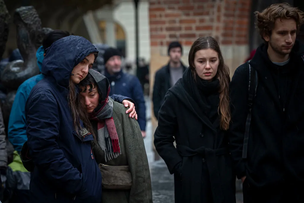 People mourn outside the Charles University building following a mass shooting on Dec. 22, 2023, in Prague, Czech Republic. Fourteen people were killed and 25 injured. Police say the gunman was a 24-year-old student at the university.?w=200&h=150