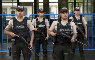 Police officers stand guard outside the City Hall building in Quito on Jan. 10, 2024, as Ecuador remains in a state of emergency following the escape from prison of a dangerous narco boss. Credit: STRINGER/AFP via Getty Images