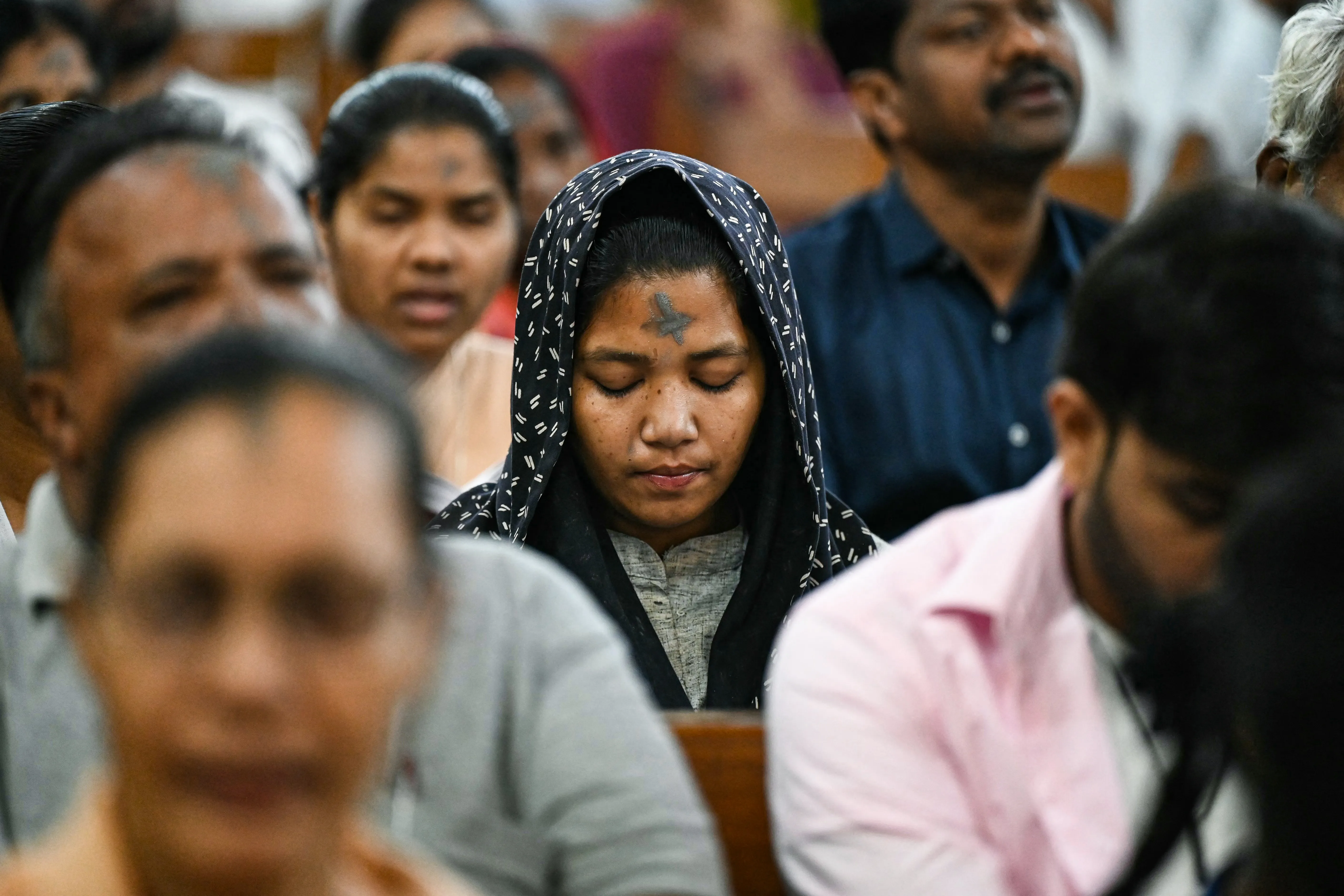 Catholic faithful offer prayers during an Ash Wednesday Mass at St. Mary's Basilica in Secunderabad, the twin city of Hyderabad in India on Feb. 14, 2024.?w=200&h=150
