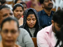 Catholic faithful offer prayers during an Ash Wednesday Mass at St. Mary's Basilica in Secunderabad, the twin city of Hyderabad in India on Feb. 14, 2024.