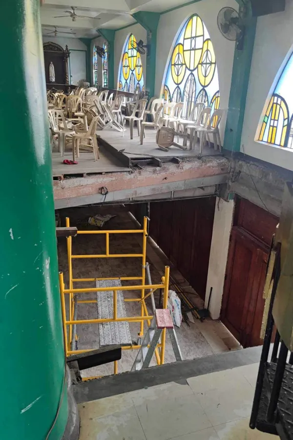 This photo shows a general view of a partially collapsed balcony inside St. Peter the Apostle Church in San Jose del Monte, Bulacan, on Feb. 14, 2024. At least 52 people were injured when the packed church balcony collapsed during Ash Wednesday service in the Philippines on Wednesday, city disaster officials said. Credit: NEIL NUNEZ/AFP via Getty Images