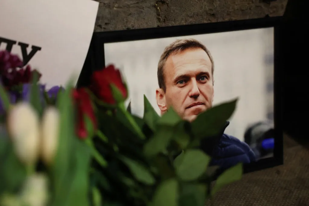 Photographs and flowers are left outside the Russian Embassy in London on Feb. 16, 2024, following the news of the death of Russian opposition leader Alexei Navalny.?w=200&h=150