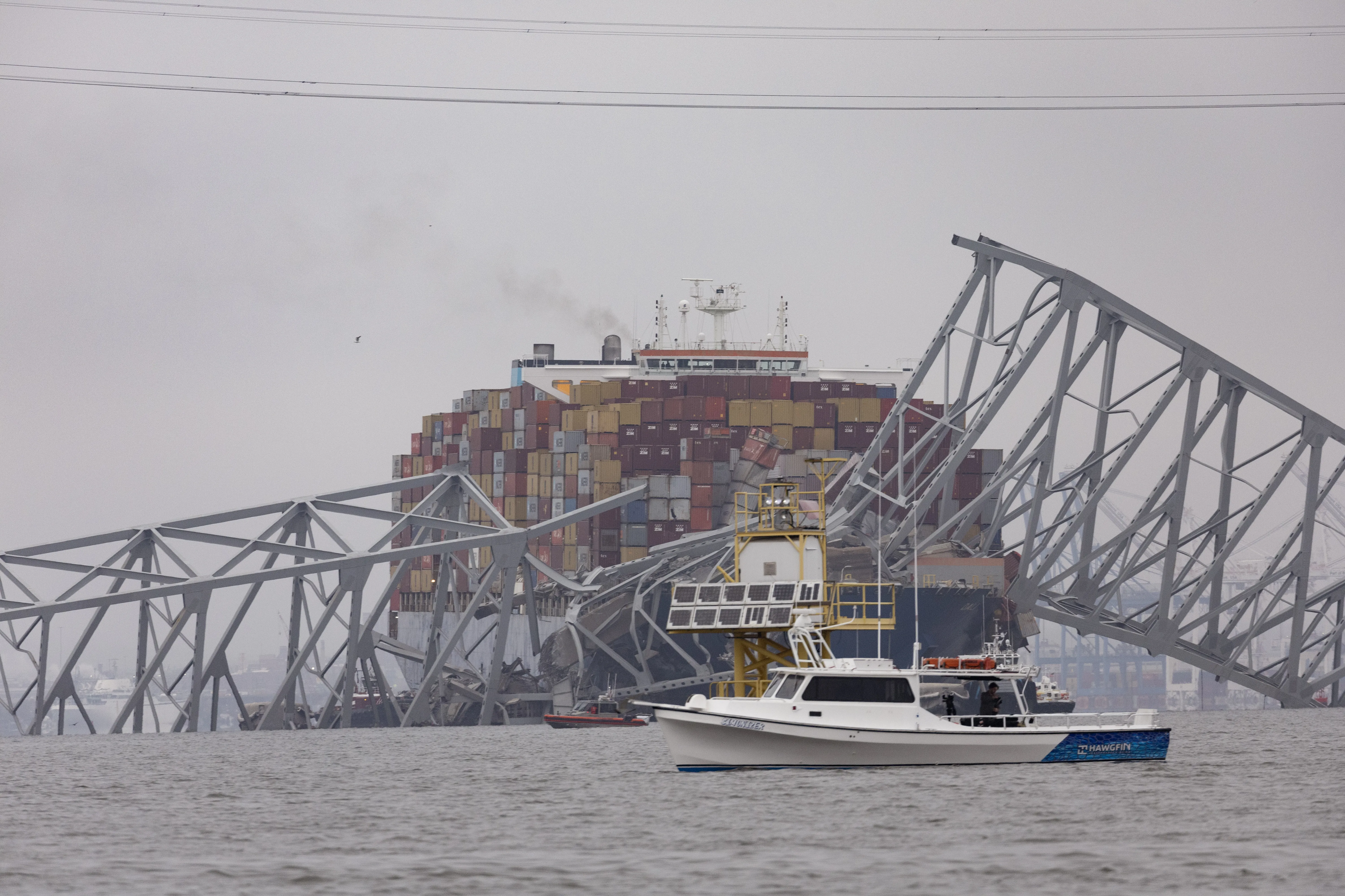 Workers continue to investigate and search for victims after the cargo ship Dali collided with the Francis Scott Key Bridge causing it to collapse yesterday, on March 27, 2024, in Baltimore.?w=200&h=150