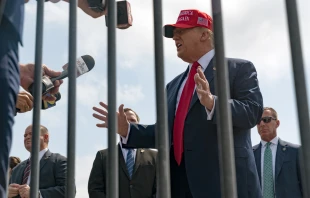 Former U.S. President Donald Trump speaks to the media as he arrives at the Atlanta airport on April 10, 2024, in Atlanta. Credit: Megan Varner/Getty Images