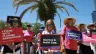 People join together during a “Rally to Stop the Six-Week Abortion Ban” held at Lake Eola Park on April 13, 2024, in Orlando, Florida.