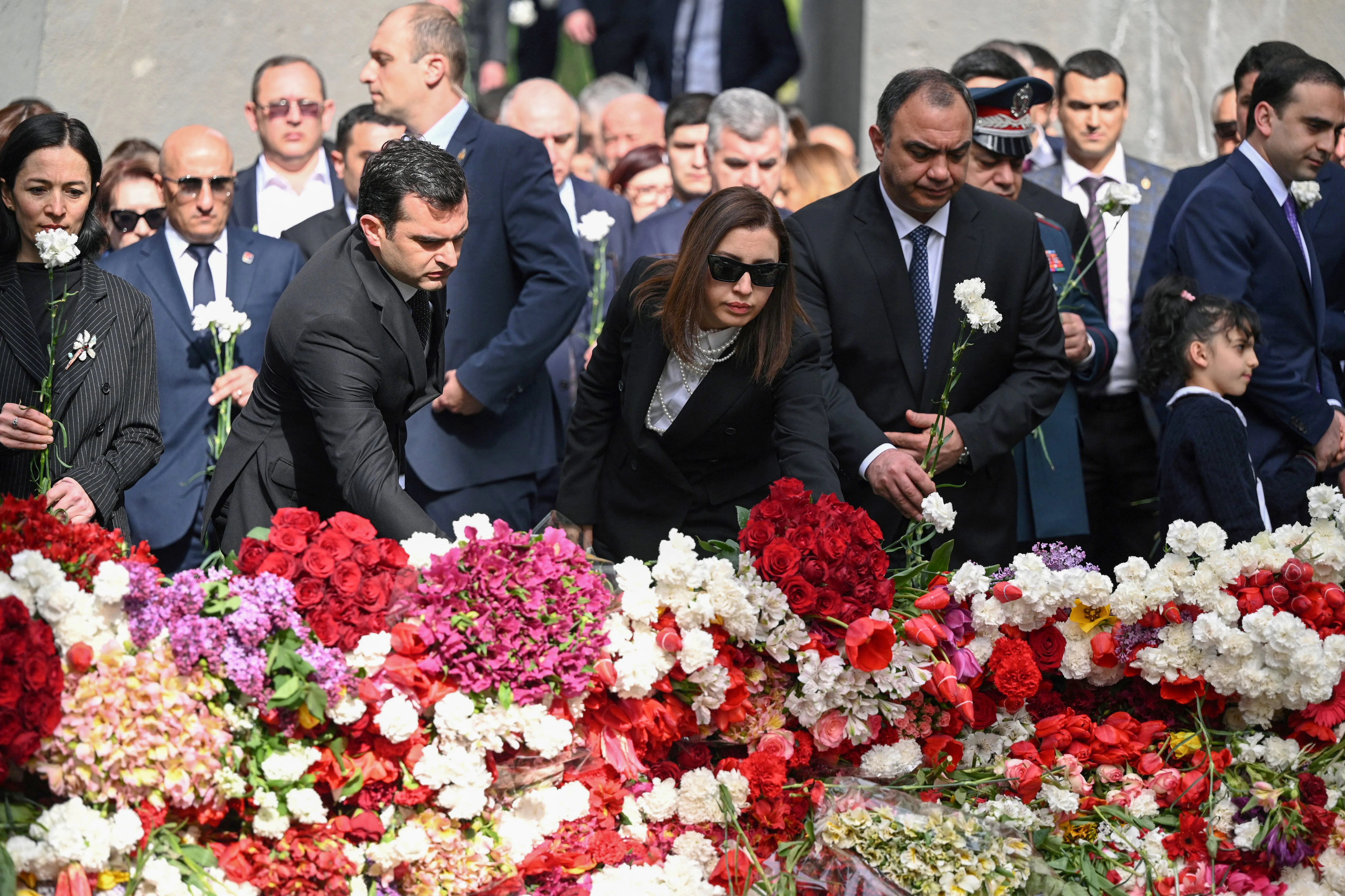 Attendees lay flowers at the Tsitsernakaberd Armenian Genocide Memorial in Yerevan to mark the 109th anniversary of World War I-era mass killings on April 24, 2024.?w=200&h=150