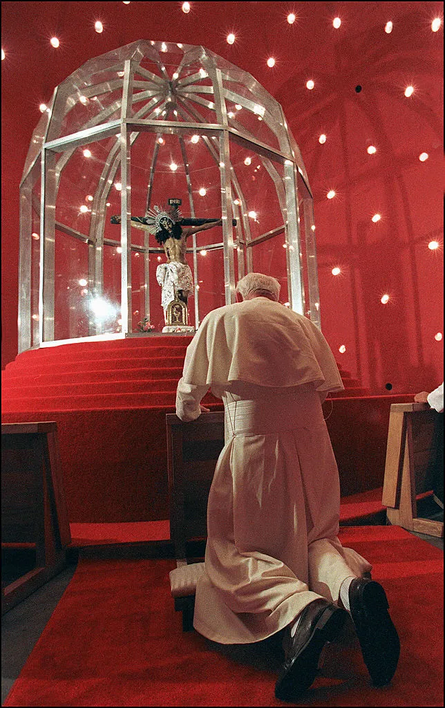 Pope John Paul II prays in Managua's cathedral before ending his visit to Nicaragua on Feb. 7, 1996.?w=200&h=150