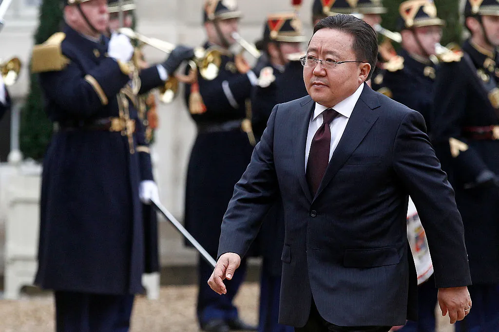Mongolian President Tsakhiagiin Elbegdorj walks past Republican Guards as he arrives before his meeting with French President Francois Hollande at the Elysee Palace on Nov. 19, 2015, in Paris.?w=200&h=150