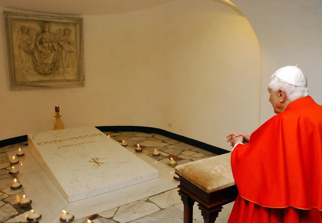 Pope Benedict XVI visits the tomb of the late Pope John Paul II in the grotto beneath St. Peter's Basilica after a meeting with young Catholics, in preparation of the XXI World Youth Day at the Vatican April 6, 2006.?w=200&h=150