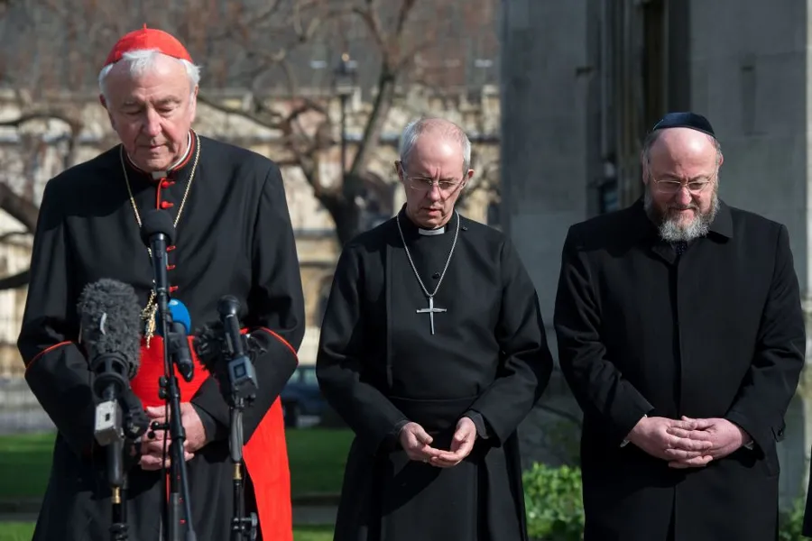 Cardinal Vincent Nichols, the Archbishop of Canterbury, Justin Welby, and Chief Rabbi Ephraim Mirvis attend a vigil in London, England, March 24, 2017.?w=200&h=150