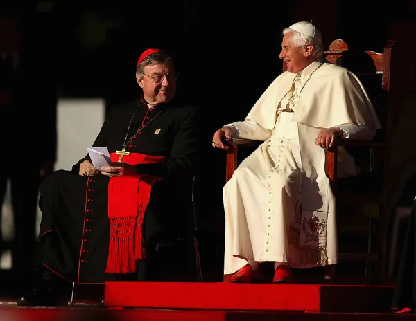 Pope Benedict XVI and Cardinal George Pell smile at one another while thanking all the volunteers at The Domain on July 21, 2008, in Sydney, Australia. Photo by Ezra Shaw/Getty Images