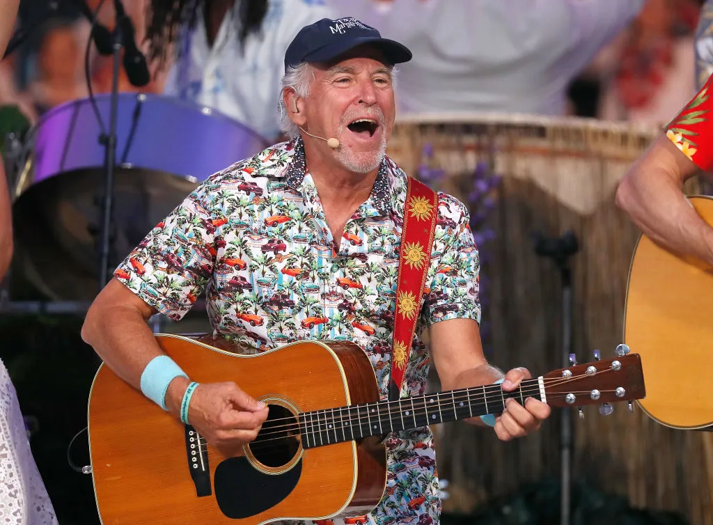 Multiplatinum-selling music legend Jimmy Buffett performs with the Broadway cast of the new musical “Escape to Margaritaville” at the 2018 A Capitol Fourth at the U.S. Capitol, West Lawn, on July 4, 2018, in Washington, D.C.?w=200&h=150
