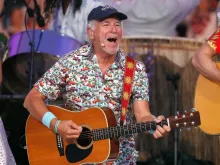 Multiplatinum-selling music legend Jimmy Buffett performs with the Broadway cast of the new musical “Escape to Margaritaville” at the 2018 A Capitol Fourth at the U.S. Capitol, West Lawn, on July 4, 2018, in Washington, D.C.
