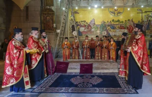 Some Greek Orthodox monks at the entrance of the Church of the Holy Sepulcher wait for the solemn entrance of the patriarch on Saturday, March 23, 2024, for the First Vesper of the first Sunday of Lent, called the "Sunday of Orthodoxy." Credit: Courtesy of Gianfranco Pinto Ostuni