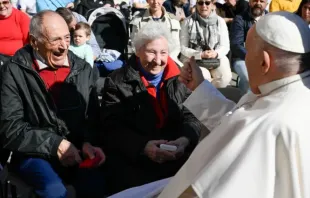 Pope Francis greets an elderly couple at a general audience in St. Peter's Square at the Vatican. Credit: Vatican Media