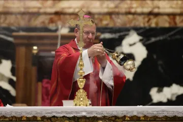 Archbishop Gintaras Grušas of Vilnius offers Mass on the feast of St. Luke for the Synod on Synodality delegates in St. Peter's Basilica on Oct. 18, 2023.