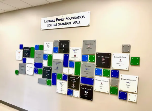 College Graduate Wall at Good Shepherd School in New Orleans, an inner-city Catholic school dedicated to academic excellence. Courtesy: Good Shepherd School