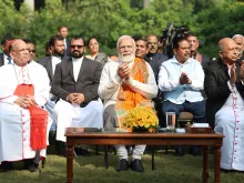 Indian Prime Minister Narendra Modi hosts a Christmas gathering with Christian leaders, including Cardinal Oswald Gracias of Mumbai and Delhi Archbishop Anil Couto, at his residence in New Delhi on Dec. 25, 2023.
