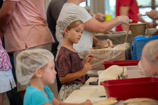 Volunteers of all ages participate in the annual meal-packing event at St. Matthew Catholic Church in Charlotte, North Carolina, which assemble hundreds of thousands of meals for the poor in Haiti each year. Phillip Budidharma/CNA