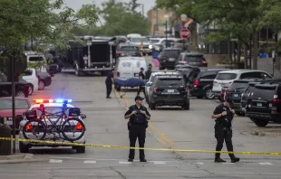 First responders take away victims from the scene of a mass shooting at a Fourth of July parade on July 4, 2022 in Highland Park, Illinois. At least six people were killed and 19 injured, according to published reports. Jim Vondruska/Getty Images