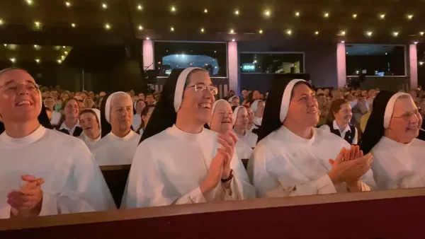 Members of the Dominican Sisters of Saint Cecilia enjoying a performance of The Hillbilly Thomists at the Grand Ole Opry in Nashville on Aug. 1, 2022. Joe Bukuras/CNA