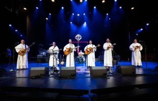 The Hillbilly Thomists perform on Aug. 1, 2022, at the Grand Ole Opry in Nashville, Tennessee. The bluegrass band, made up of Dominican friars, was the opening act of a concert hosted by the Knights of Columbus in conjunction with the fraternal order's annual convention. Courtesy of Matthew Barrick/Knights of Columbus