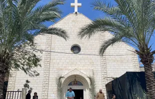 People gather at the Roman Catholic Church of the Holy Family on Palm Sunday in al-Zaitoun neighborhood of Gaza City on March 24, 2024, amid the ongoing conflict between Israel and the Palestinian Hamas movement. Credit: AFP via Getty Images
