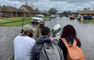 Louisiana National Guardsmen rescue people in LaPlace, Louisiana, in the aftermath of Hurricane Ida. More than 6,000 members of the National Guard from more than a dozen states were in Louisiana assisting state and federal partners with relief efforts. Photo courtesy of the Louisiana National Guard via Flickr (CC BY 2.0)