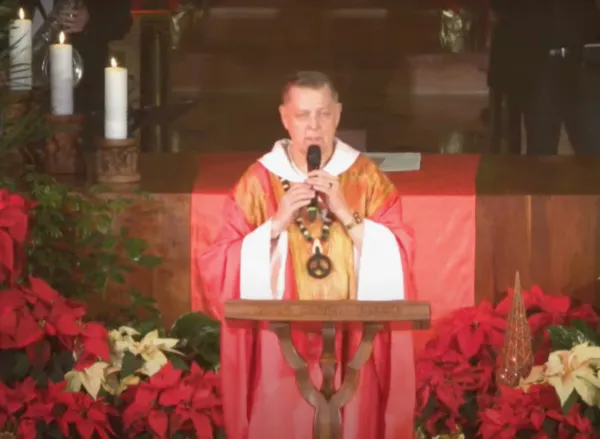 Father Michael L. Pfleger, senior pastor of St. Sabina Church in Chicago, gives his homily during the parish's Christmas Eve Mass on Dec. 24, 2021. Screenshot from St. Sabina YouTube video.