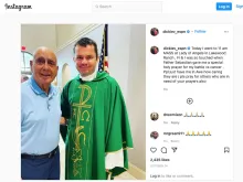 ESPN College basketball analyst Dick Vitale with Father Sebastian Szczawinski, the administrator of Vitale's parish, Our Lady of the Angeles, in Lakewood Ranch, Florida.