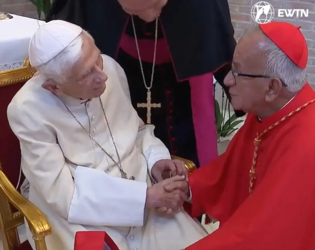Pope Emeritus Benedict XVI greets Colombian Cardinal Jorge Enrique Jiménez Carvajal at the retired pope's Vatican residence on Aug. 27, 2022.?w=200&h=150