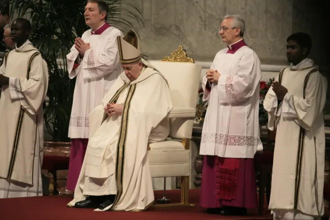 Pope Francis prays at the Epiphany Mass on Jan. 6, 2023.